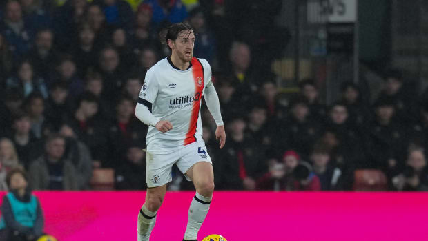 Tom Lockyer pictured playing for Luton Town against Bournemouth in December 2023